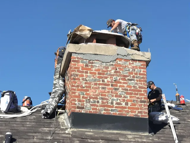 Richmond Hill Chimney Sweep installing a custom chimney crown in Richmond Hill, GA
