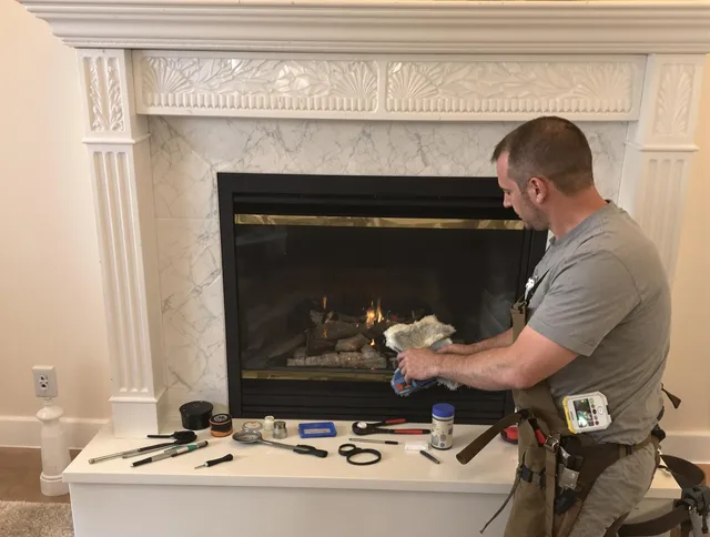 Richmond Hill Chimney Sweep performing fireplace maintenance in Richmond Hill, GA